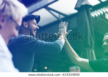 Group of people meeting and high five Royalty-Free Stock Photo #614324840
