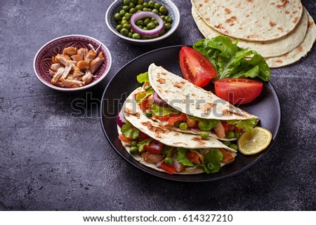 Mexican tacos with meat and vegetable. Selective focus