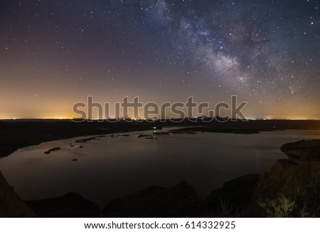 Night long exposure photography: View of the Milky Way within Barrancas de Burujon natural monument, Toledo, Spain. 