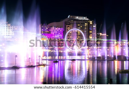 Light and water fountains show at Darling Harbour Royalty-Free Stock Photo #614415554