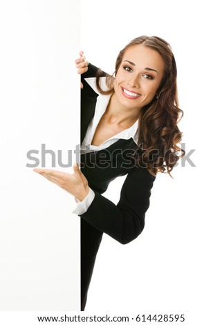 Happy smiling young businesswoman showing blank signboard, isolated on white background. Success in business concept.