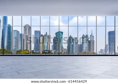 Panoramic skyline and buildings in shanghai from glass window