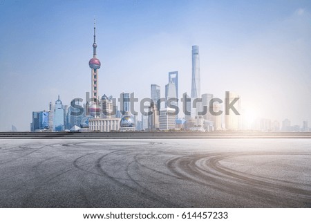 Panoramic skyline and buildings with empty concrete square floor shanghai landmark