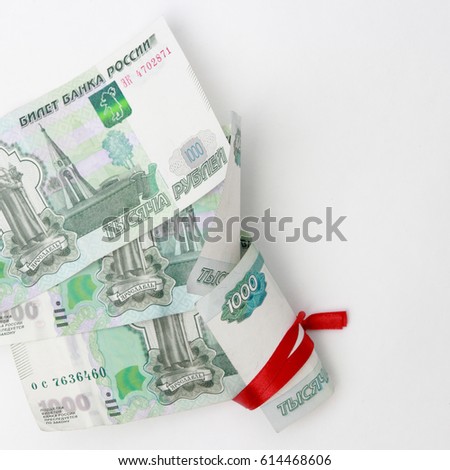 russian money and red ribbon