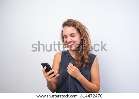 Young beautiful woman using smart phone