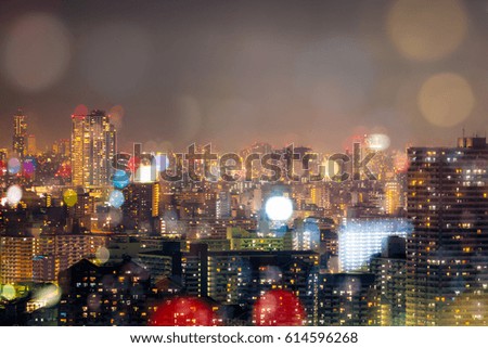 City night background. Nightlife in City with blur bokeh light background decoration on colorful filter background.