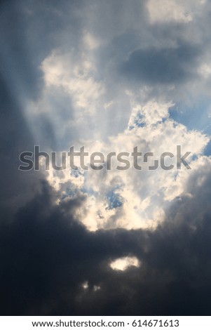 sunlight breaking through clouds