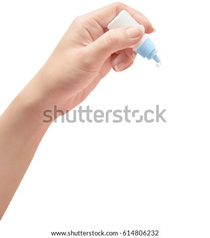 Hand with eye drop bottle isolate is on white background with clipping path