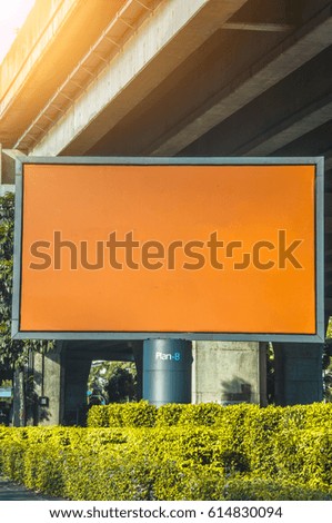 Orange billboard blank for outdoor advertising poster or blank billboard with urban background