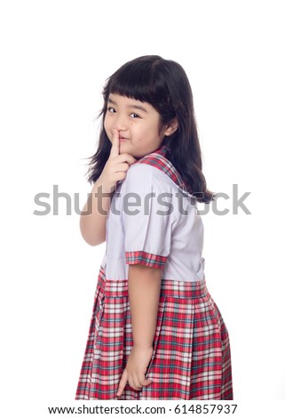Portrait of asian child in school uniform on white background isolated