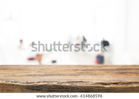 Empty wooden table and blurred people in cafe background, product display.Ready for product montage
