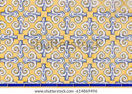 Background with Spanish deorativnoy ceramic tiles, blue and yellow colors