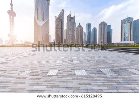 Panoramic skyline and buildings with empty concrete square floor