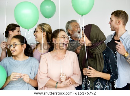 Group of Diverse People with Party Balloons