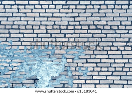 Old blue toned weathered brick wall texture.  Background and texture.