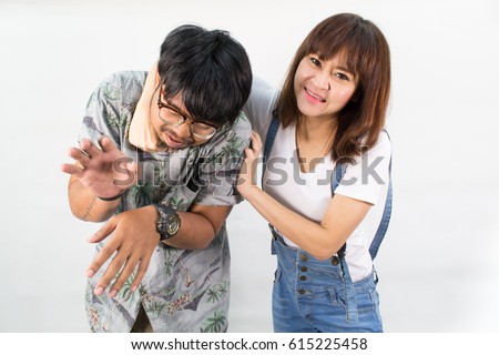 Domestic violence, woman angry : being abused and strangled, man being abused and strangled by a woman, woman strangling a man isolated on white background
