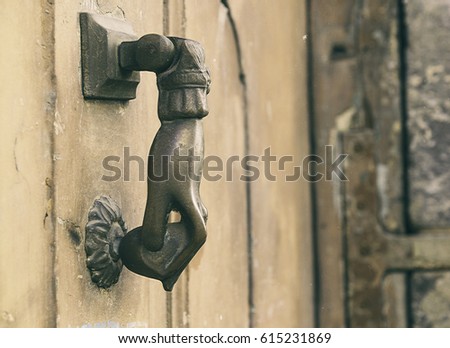 vintage metal hand door knocker