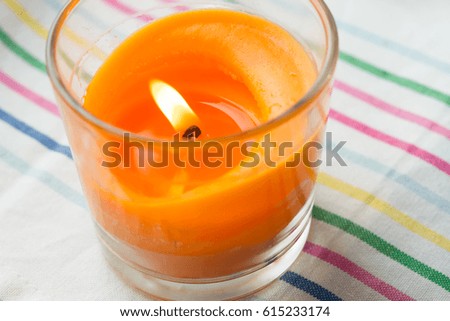 color candle on a table .