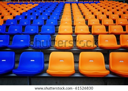 Color seat in football stadium Royalty-Free Stock Photo #61526830