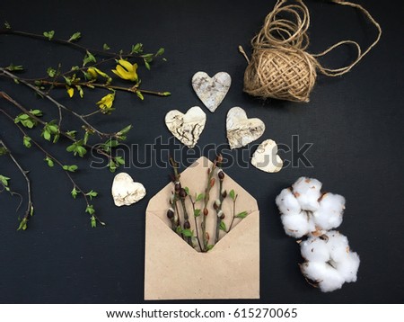 Spring. Rustic spring. Spring envelope with spring buds and greenery.