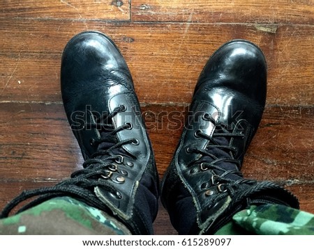 Military combat boots on duty