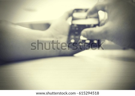 Picture blurred  for background abstract and can be illustration to article of hand use mobile phone