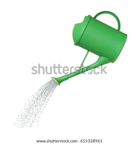 water pours from a watering can on white background                           Royalty-Free Stock Photo #615328961