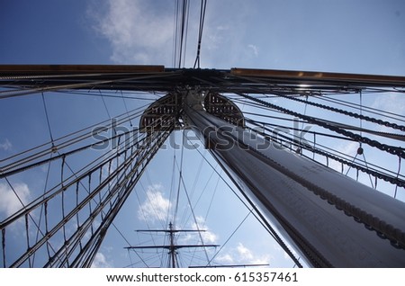 Aloft in the rigging of a mighty ship