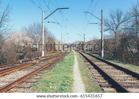 railway track in the countryside in the spring