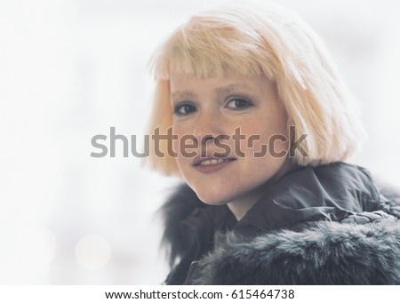 Winter Beautiful woman city portrait cold time. Outdoor shot.