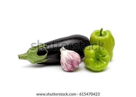 Pepper, eggplant and garlic on a white background. Horizontal photo.