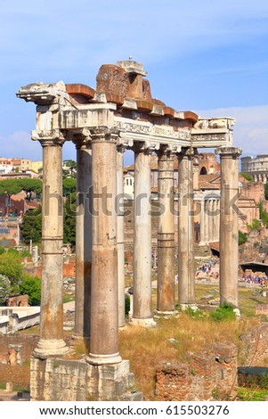 Tall columns of ancient Roman temple in Rome, Italy