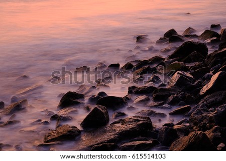 the sea beach with slow speed shutter in the twilight