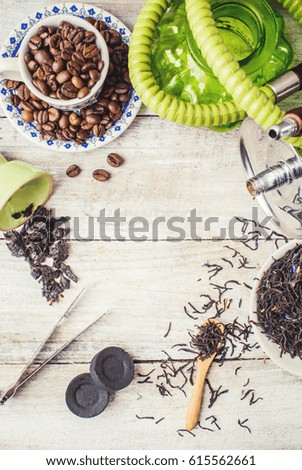 Hookah on a wooden background. Tobacco fruit. Selective focus. 