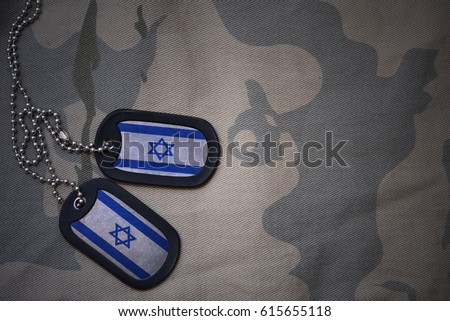 army blank, dog tag with flag of israel on the khaki texture background. military concept