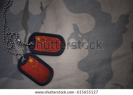 army blank, dog tag with flag of china on the khaki texture background. military concept