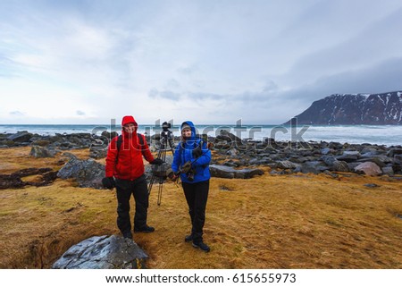 Family of photographers on the Scagsanden beach in Lofoten islands