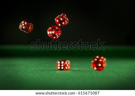 red dice. green table
