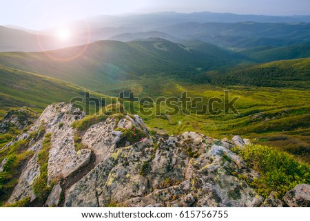 Mountain valley during sunrise / sunset. Natural summer landscape.
Colorful summer landscape in the Carpathian mountains. Stone surface Royalty-Free Stock Photo #615756755