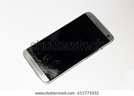 Broken phone on white background
