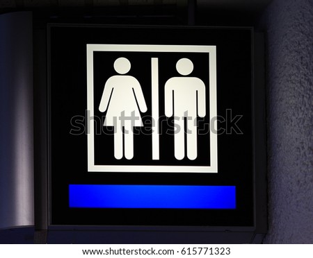 Airport restroom sign