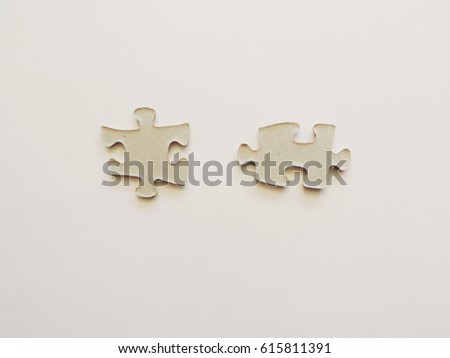 Two pieces puzzle jigsaw.          