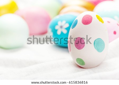  Colorful Easter Eggs on white with copy space.
