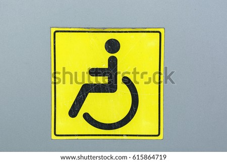 Close up disabled sign on a wall