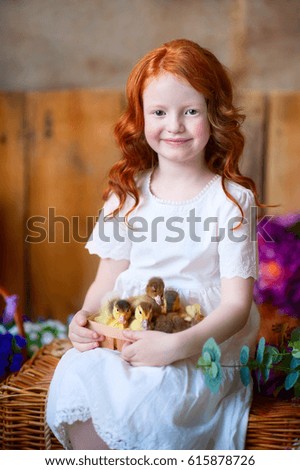 red child with the ducks in the Studio