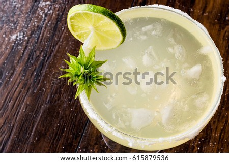 Classic Margarita Cocktail with lime, salt and ice.
