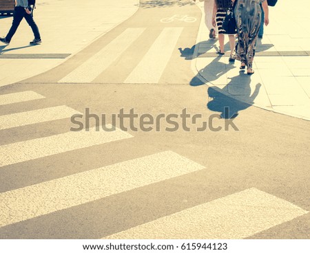 People on a street/toned photo/abstract photo