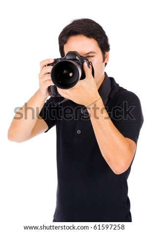 Young male photographer at studio, isolated on white