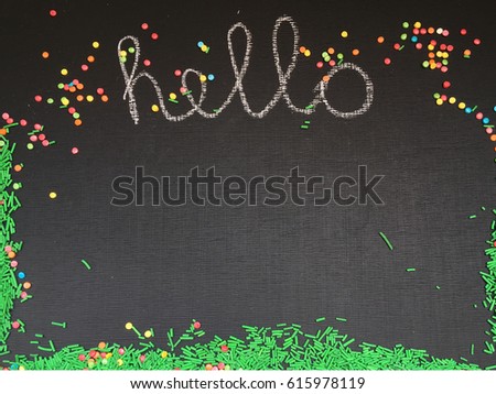 hello written on a black chalkboard. rustic chalk hello background with space for your text
