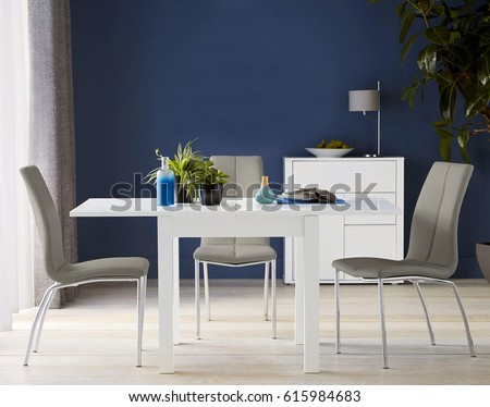 Interior design of dining room in a new house Royalty-Free Stock Photo #615984683